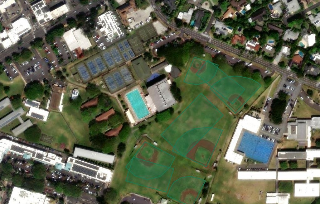 Satellite view of a park with each baseball and soccer field outlined in green on the map